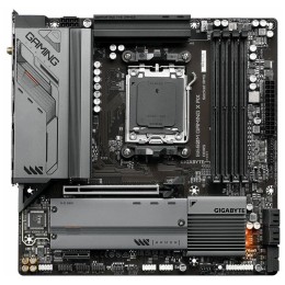 Материнская плата Gigabyte B650M GAMING X AX, Socket AM5, AMD B650, 4xDDR5-5200, HDMI+DP+DP, 1xPCI-Ex16, 1xPCI-Ex1, 4xSATA3(RAID 0/1/10), 2xM.2, 8 Ch Audio, 2.5GLan, WiFi, (4+4)xUSB2.0, (3+2)xUSB3.2, (1+1)xUSB3.2 Type-C™, 1xPS/2, mATX, RTL {}