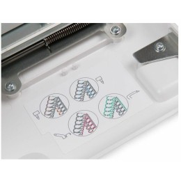 Машина-оверлок JANOME 4952 белый